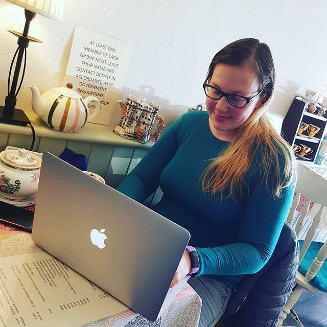 Picture of me editing some books in Miss Marples Tea Rooms